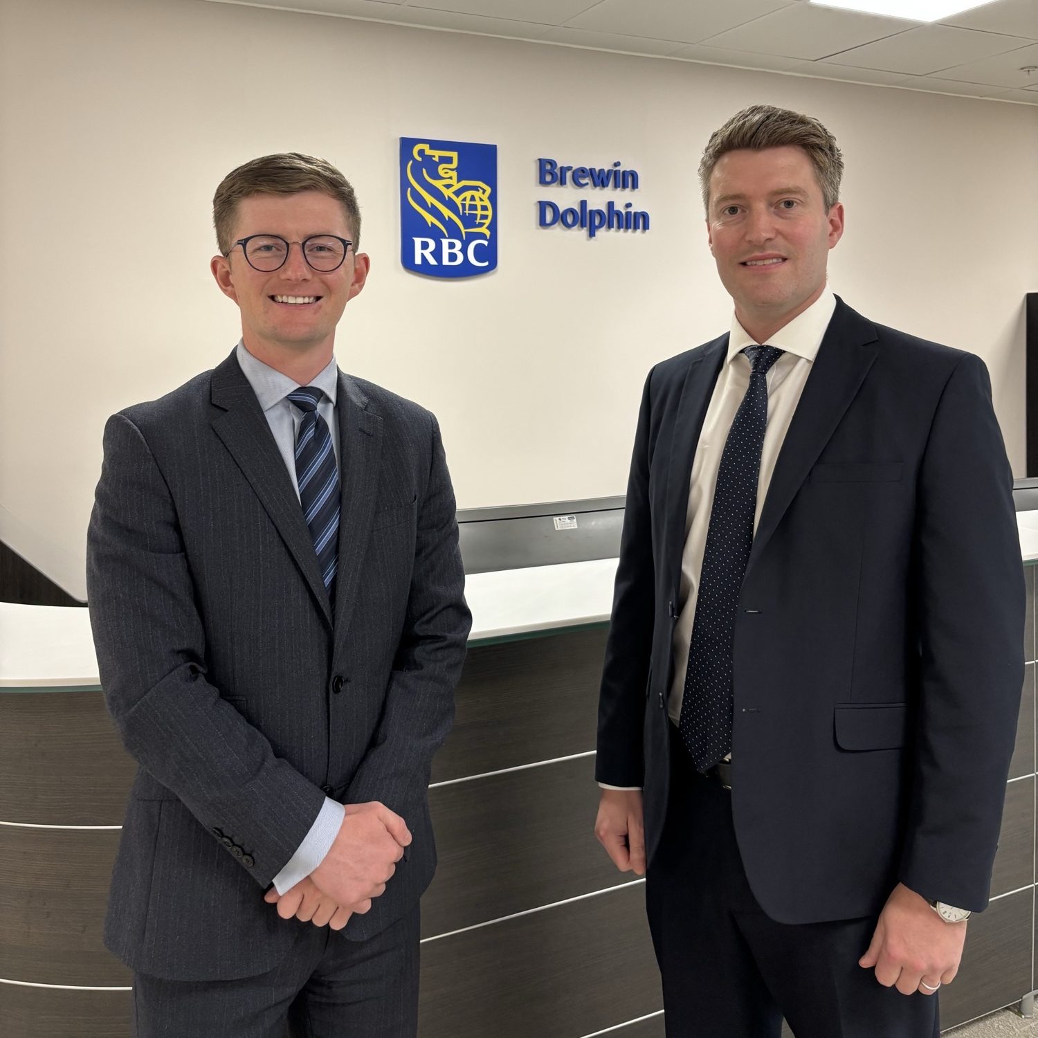 Jack Benton (left) and Gordon Parsons-Wallace (right) at RBC Brewin Dolphin, Glasow office.